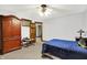 Bedroom with a large wardrobe and a blue bedspread at 5571 Poff Rd, Martinsville, IN 46151