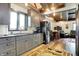 A second view of the kitchen featuring countertops and stainless appliances at 5571 Poff Rd, Martinsville, IN 46151