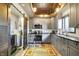 Stylish kitchen with gray cabinets, stainless steel appliances, and convenient layout at 5571 Poff Rd, Martinsville, IN 46151