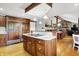 Spacious kitchen with a butcher block island, wooden cabinets, and stainless steel appliances at 5571 Poff Rd, Martinsville, IN 46151