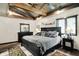 Comfortable main bedroom with a large bed, dresser, and bedside tables at 5571 Poff Rd, Martinsville, IN 46151