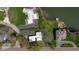 Aerial view showcasing the lakefront property, landscaping, and surrounding neighborhood at 601 Terrace Lake Dr, Columbus, IN 47201