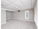 Finished basement with neutral walls, carpet, and natural light for a comfortable space at 601 Terrace Lake Dr, Columbus, IN 47201