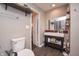 Bathroom with a comfort height toilet and modern sink at 601 Terrace Lake Dr, Columbus, IN 47201