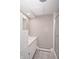 Bathroom featuring a tile floor, shower, white vanity, and cabinet space at 601 Terrace Lake Dr, Columbus, IN 47201