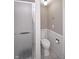 Bathroom featuring a shower and standard height toilet with a tile floor at 601 Terrace Lake Dr, Columbus, IN 47201