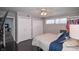 Comfortable bedroom with a ceiling fan, double closets and natural light at 601 Terrace Lake Dr, Columbus, IN 47201