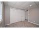 Bedroom featuring a closet, neutral colored walls, carpet and a window at 601 Terrace Lake Dr, Columbus, IN 47201