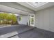 View of covered front entrance featuring a wood deck and a welcoming entryway at 601 Terrace Lake Dr, Columbus, IN 47201