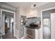 This remodeled kitchen showcases stainless steel appliances and a modern backsplash design at 601 Terrace Lake Dr, Columbus, IN 47201