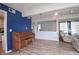 Open concept living area with a piano, offering seamless flow and natural light, creates an inviting and versatile space at 601 Terrace Lake Dr, Columbus, IN 47201