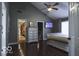 Bedroom featuring vaulted ceiling, ceiling fan, and closet and ensuite access at 6019 Timberbend Dr, Avon, IN 46123