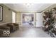 Cozy living room featuring a modern bookshelf and neutral decor at 6019 Timberbend Dr, Avon, IN 46123