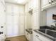 Well-organized mudroom with custom cabinetry, bench seating, and storage at 6019 Timberbend Dr, Avon, IN 46123