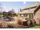 Backyard with a covered pool, patio furniture, and well-maintained landscaping at 6019 Timberbend Dr, Avon, IN 46123