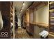 Well-organized walk-in closet with custom wood shelving and ample storage at 6019 Timberbend Dr, Avon, IN 46123
