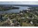 Stunning aerial shot of the lake and lakeside homes, capturing the peaceful and picturesque setting at 6140 Buttonwood Dr, Noblesville, IN 46062