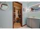 This bathroom offers penny tile flooring and a vanity with mirror, providing a clean and functional space at 6140 Buttonwood Dr, Noblesville, IN 46062