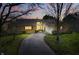 Charming single-Gathering home boasts a brick facade, attached garage, and a curved driveway at 6140 Buttonwood Dr, Noblesville, IN 46062