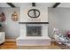 Painted white brick fireplace provides a focal point in this cozy living room at 6140 Buttonwood Dr, Noblesville, IN 46062