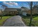 Charming single-Gathering home with brick facade and driveway leading to the attached garage at 6140 Buttonwood Dr, Noblesville, IN 46062