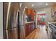 Spacious kitchen featuring wood cabinets, stainless steel refrigerator, and an open layout at 6140 Buttonwood Dr, Noblesville, IN 46062