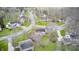 Aerial view of a home in a well-kept neighborhood with mature trees and green lawns at 7002 Oakbay Cir, Noblesville, IN 46062