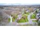 Picturesque aerial view of a lovely neighborhood surrounded by lush greenery and mature trees at 7002 Oakbay Cir, Noblesville, IN 46062