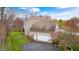 Side view of house showing garage and driveway at 7002 Oakbay Cir, Noblesville, IN 46062