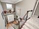 Grand foyer with hardwood floors, high ceilings, and a staircase leading to the upper level at 7002 Oakbay Cir, Noblesville, IN 46062