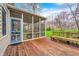 The inviting screened-in porch extends living space, connecting seamlessly to the expansive deck and backyard at 7002 Oakbay Cir, Noblesville, IN 46062