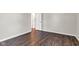 Spacious bedroom with wood-look floors and neutral walls, awaiting personalization at 720 Danielle Rd, Lebanon, IN 46052