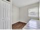 Bedroom featuring dark wood-like flooring and a built-in desk at 720 Danielle Rd, Lebanon, IN 46052