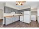 Well-lit kitchen area with gray cabinetry and convenient appliances at 720 Danielle Rd, Lebanon, IN 46052