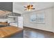 Bright eat-in kitchen with painted cabinets and white appliances at 720 Danielle Rd, Lebanon, IN 46052