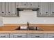Spacious kitchen features a stainless steel sink and butcher block counters at 720 Danielle Rd, Lebanon, IN 46052