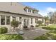 Elegant home featuring a brick exterior and a cozy backyard patio for outdoor relaxation and entertainment at 7259 Josiah Ct, Indianapolis, IN 46259