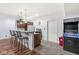 Charming wet bar area with stainless appliances, pendant lights, and ample counter space, perfect for entertaining at 7259 Josiah Ct, Indianapolis, IN 46259