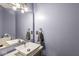 Modern bathroom featuring a vessel sink, chrome fixtures, and a large mirror at 7259 Josiah Ct, Indianapolis, IN 46259