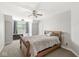Bright bedroom with wooden bed frame and cozy atmosphere at 7259 Josiah Ct, Indianapolis, IN 46259