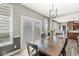 Dining room features sliding door access to backyard, and is adjacent to the kitchen at 7259 Josiah Ct, Indianapolis, IN 46259