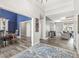 Open-concept foyer with hardwood floors, leading to the dining room, living room, and other areas of the house at 7259 Josiah Ct, Indianapolis, IN 46259
