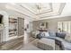Bright living room with coffered ceiling, gray walls and an open layout at 7259 Josiah Ct, Indianapolis, IN 46259