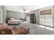 Spacious main bedroom featuring neutral decor, tray ceilings, and carpet flooring at 7259 Josiah Ct, Indianapolis, IN 46259