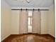 Bedroom area featuring carpet flooring and double doors leading into another room at 7367 Parkside Dr, Indianapolis, IN 46226
