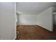 Bright living room space with neutral walls and carpet flooring at 7367 Parkside Dr, Indianapolis, IN 46226