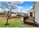 Wood deck overlooking green lawn and a serene, flowing stream at 7783 Park N Ct, Indianapolis, IN 46260