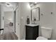 Cozy bathroom featuring a modern vanity, neutral paint, and streamlined fixtures at 7783 Park N Ct, Indianapolis, IN 46260