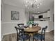 Cozy dining area adjacent to the kitchen, ideal for casual meals and entertaining at 7783 Park N Ct, Indianapolis, IN 46260