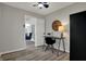 Bright office space with a ceiling fan and view into the living room at 7783 Park N Ct, Indianapolis, IN 46260